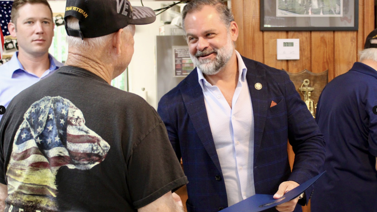 Congressman Mills with constituents 